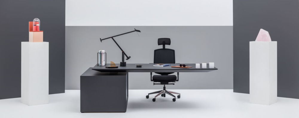 Gravity height adjustable executive desk